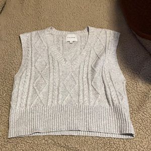 grey sweater vest